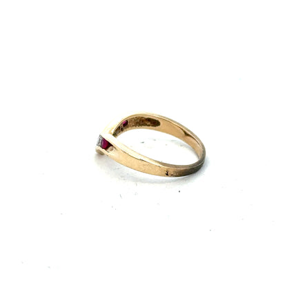 9ct yellow gold ring in size J, featuring a smooth polished band and classic design.