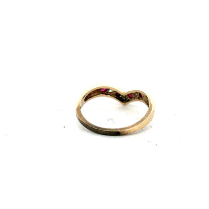 9ct yellow gold ring in size J, unbranded, showcasing a smooth polished band with a classic design.