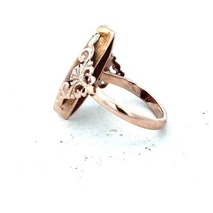 9ct yellow gold ring in size J with a simple band design, unbranded jewelry displayed on a plain background.