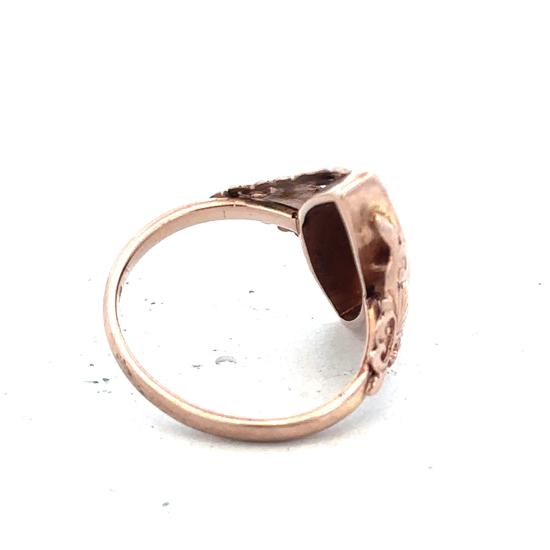9ct yellow gold ring in size J, unbranded, with a smooth polished band and classic design, displayed on a neutral background.