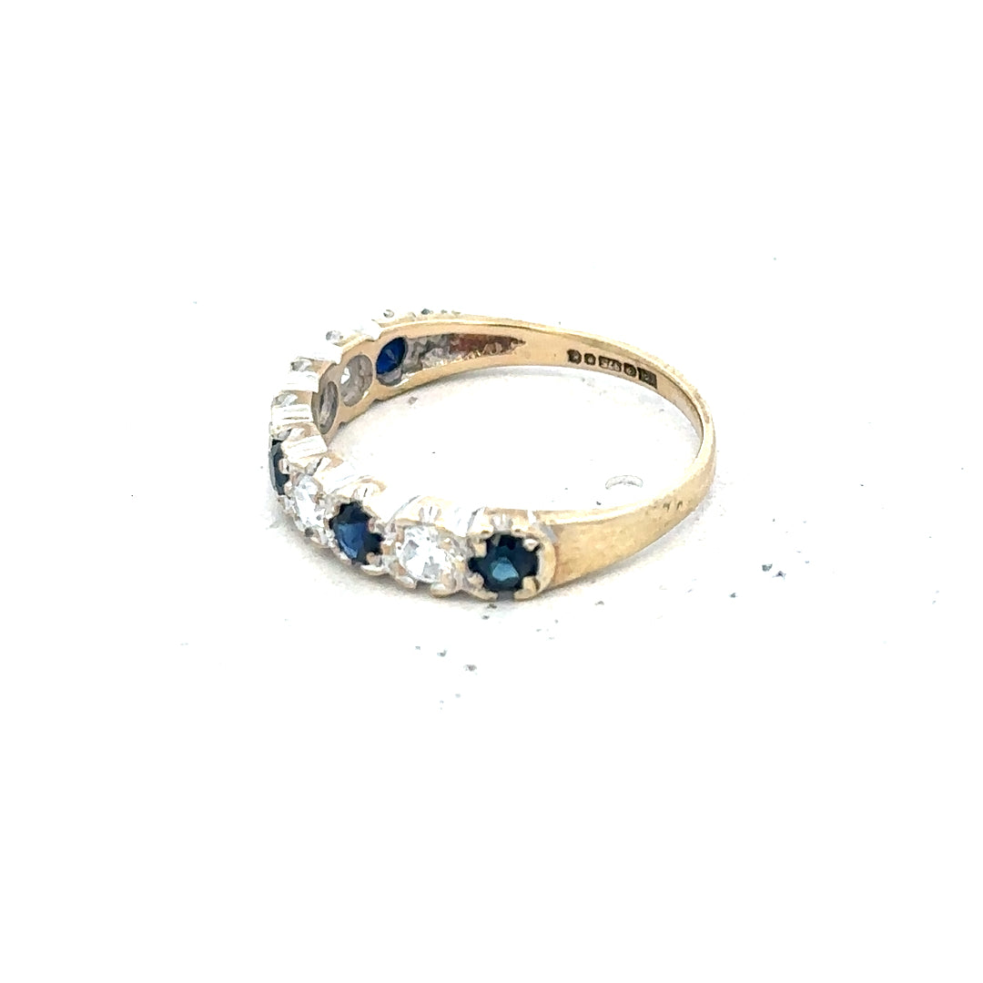 9ct yellow gold ring size J with a smooth band, unbranded jewelry piece displayed on a neutral background.