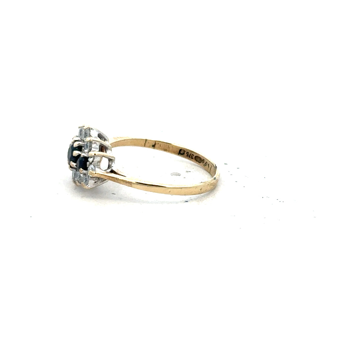 9ct yellow gold ring in size J1/2 with a smooth band, unbranded jewelry, showcasing a shiny gold finish and classic design.