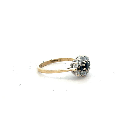 9ct yellow gold ring in size J1/2, featuring a smooth band and classic design, displayed on a neutral background.