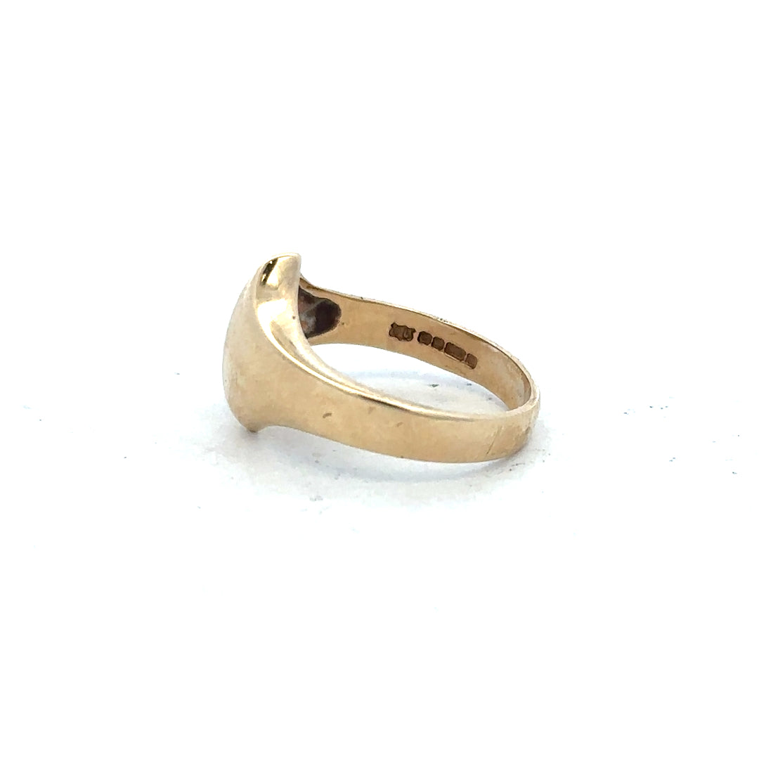 9ct yellow gold ring in size K with a smooth polished band, unbranded jewelry showcasing classic gold craftsmanship.