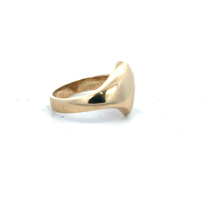 9ct yellow gold ring in size K with a smooth band, unbranded jewelry, shown close-up against a neutral background.