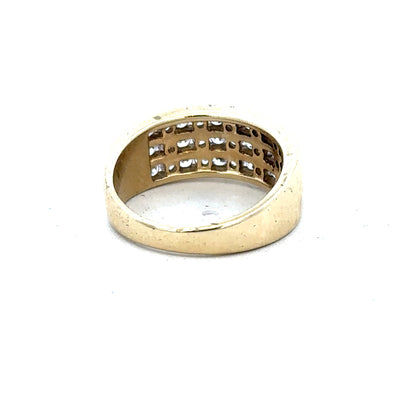 9ct yellow gold ring in size K with a smooth band, unbranded, shown from a side angle on a plain background.