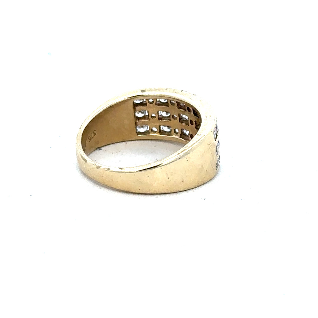 9ct yellow gold ring in size K with a smooth band, unbranded jewelry piece shown on a white background.