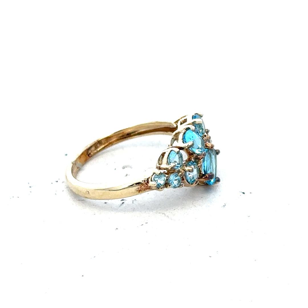9ct yellow gold ring in size K with a simple band design, unbranded jewelry, close-up view showing the smooth gold surface.