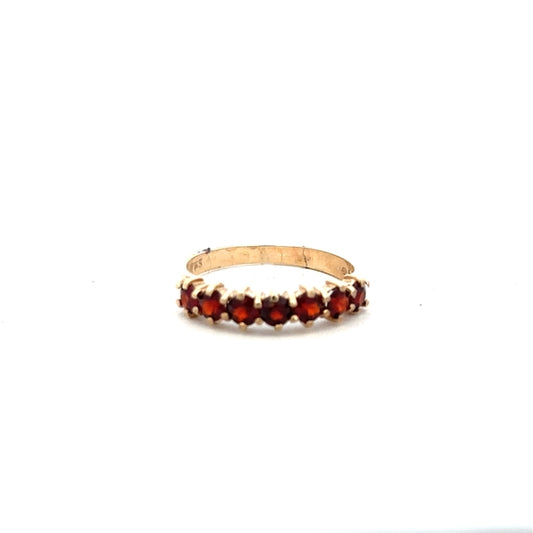 9ct yellow gold ring in size K1/2 with a smooth band, unbranded, shown in a close-up view.