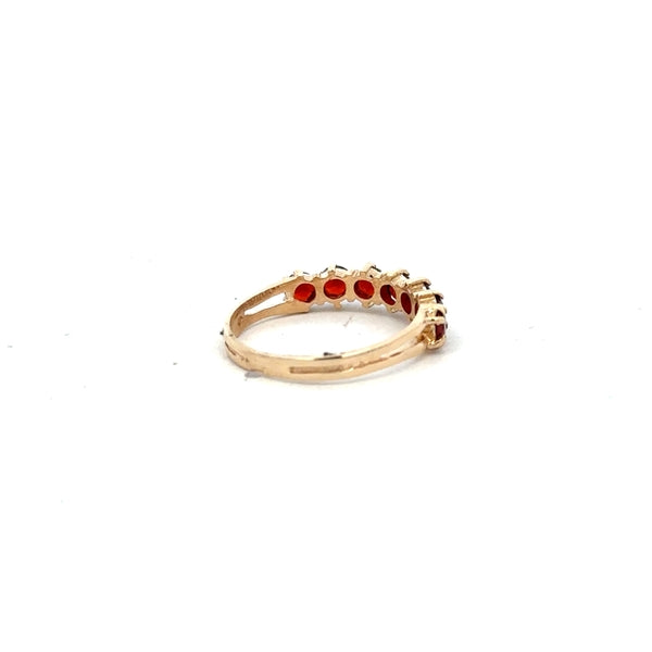 9ct yellow gold ring size K1/2 with a smooth band, unbranded jewelry, shown from a side angle.