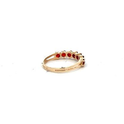 9ct yellow gold ring size K1/2 with a smooth band, unbranded jewelry, shown from a side angle.