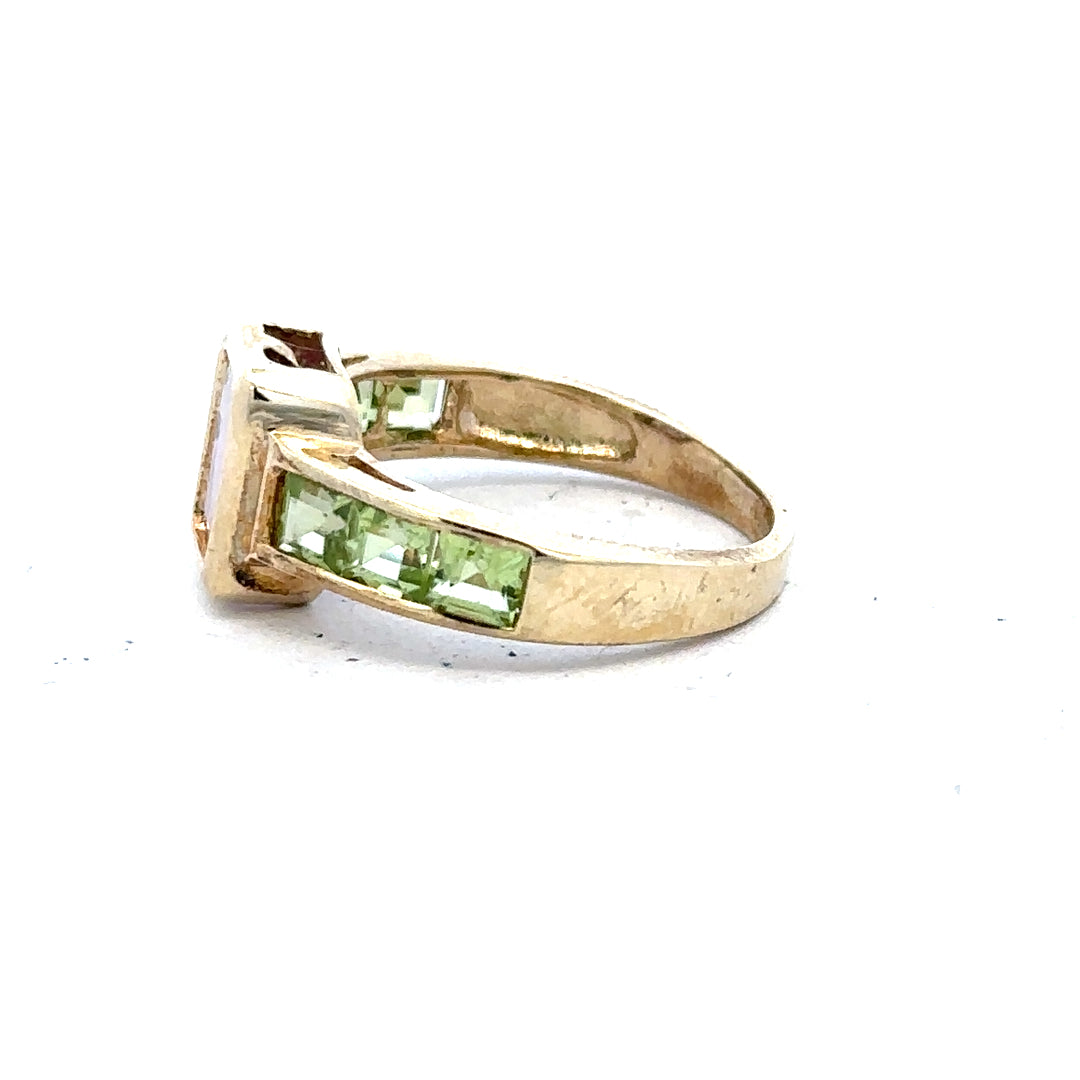 9ct yellow gold ring in size K1/2 with a smooth polished band, displayed against a neutral background.