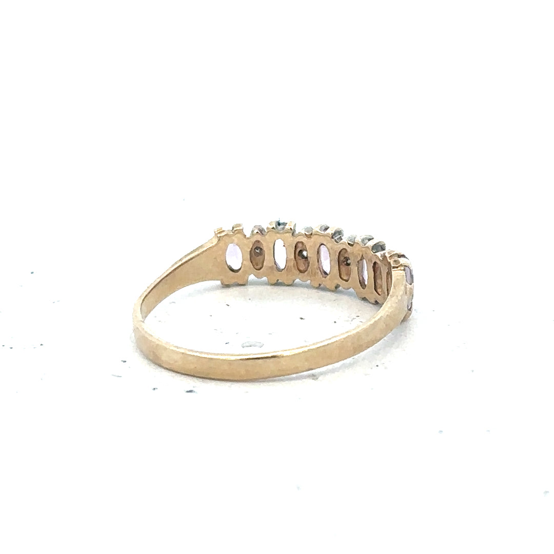 9ct yellow gold ring size K1/2 with simple band design, shown in close-up image highlighting the smooth gold finish.