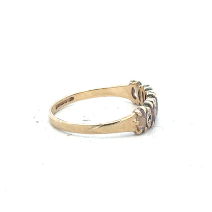 9ct yellow gold ring size K 1/2 with smooth band, unbranded jewelry, shown in a close-up image.
