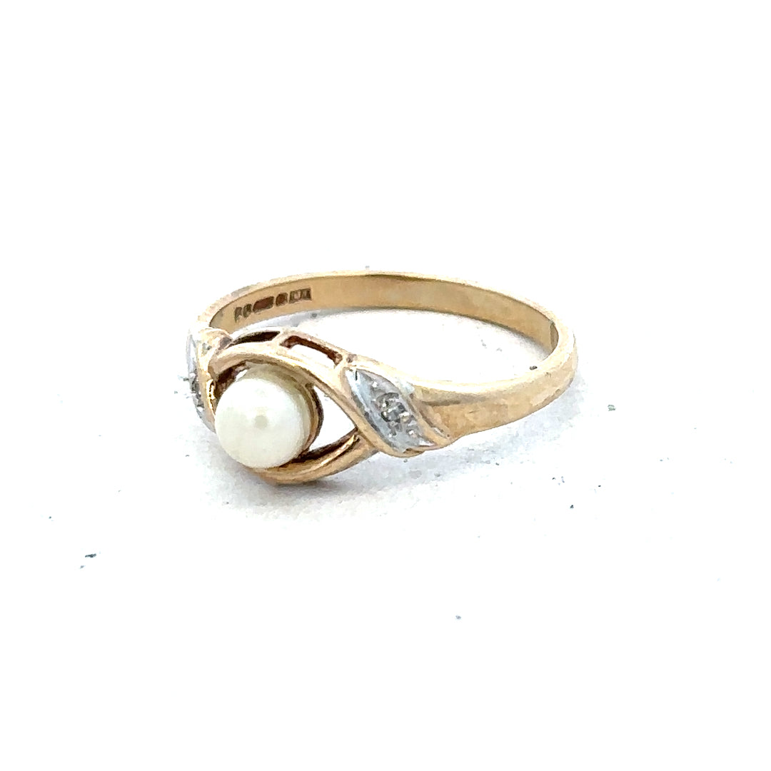 9ct yellow gold ring in size K1/2, featuring a simple band design, unbranded, suitable for everyday wear.