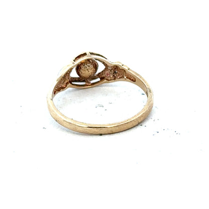9ct yellow gold ring in size K1/2, featuring a smooth band design, unbranded jewelry, showcasing fine craftsmanship.