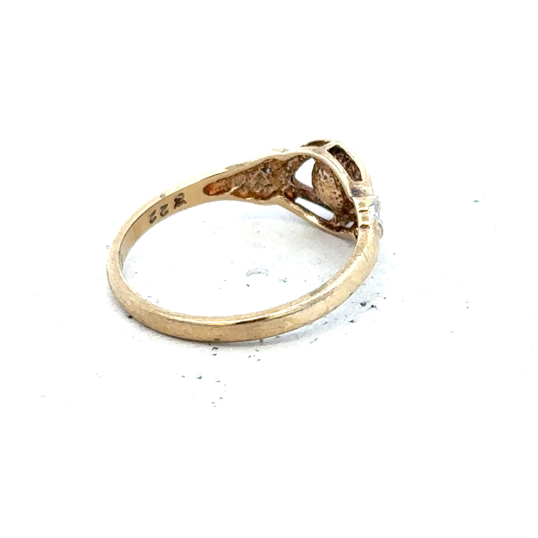 9ct yellow gold ring in size K1/2 with a smooth band, crafted from unbranded gold, shown on a plain background.