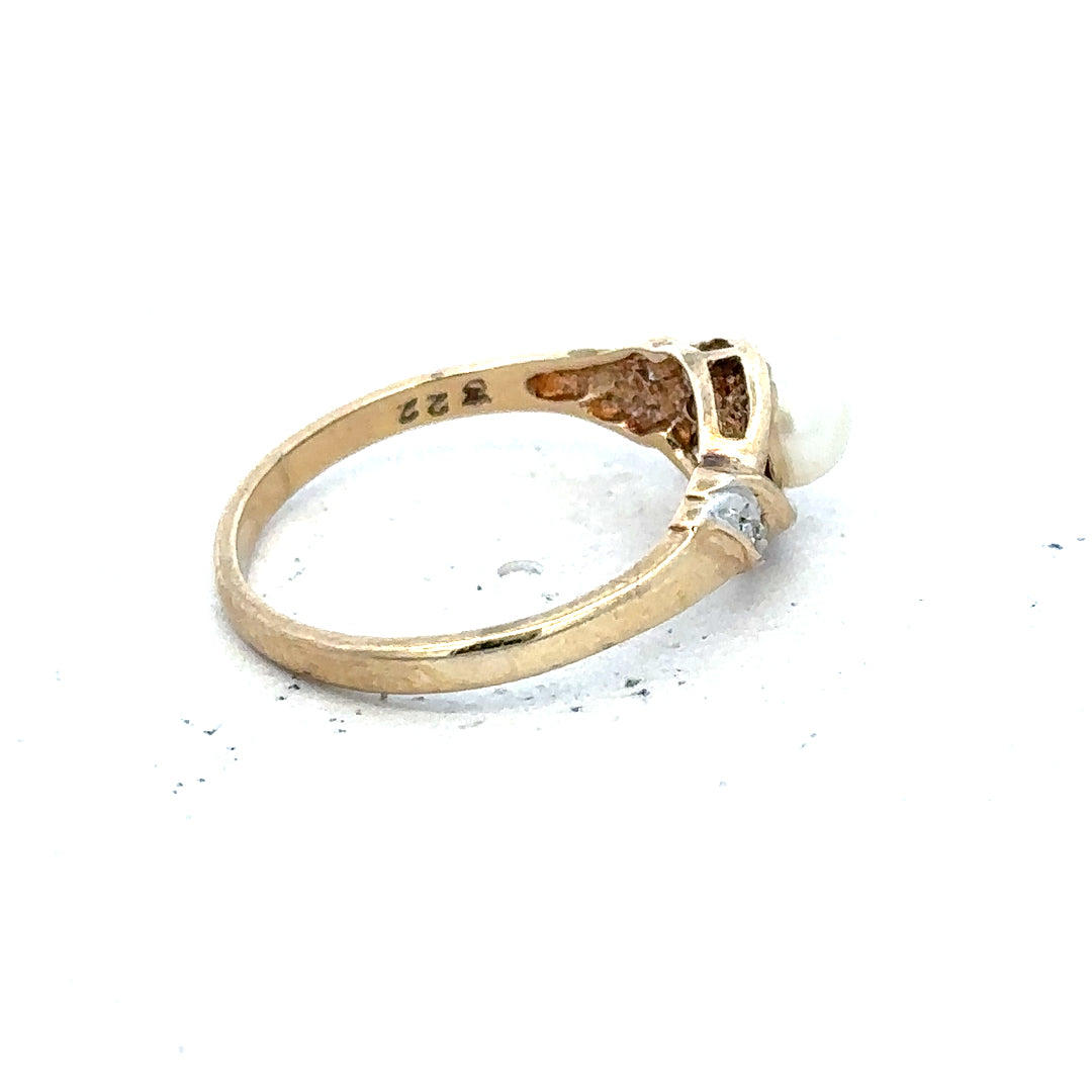 9ct yellow gold ring in size K1/2, featuring a smooth polished band and classic design.