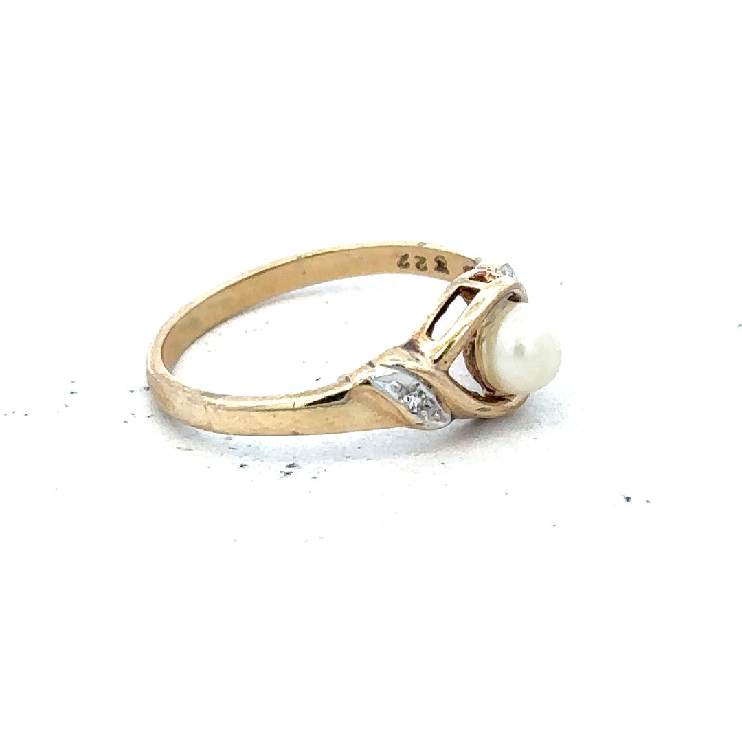 9ct yellow gold ring size K1/2 with a smooth polished band, unbranded jewelry, shown in a close-up image.