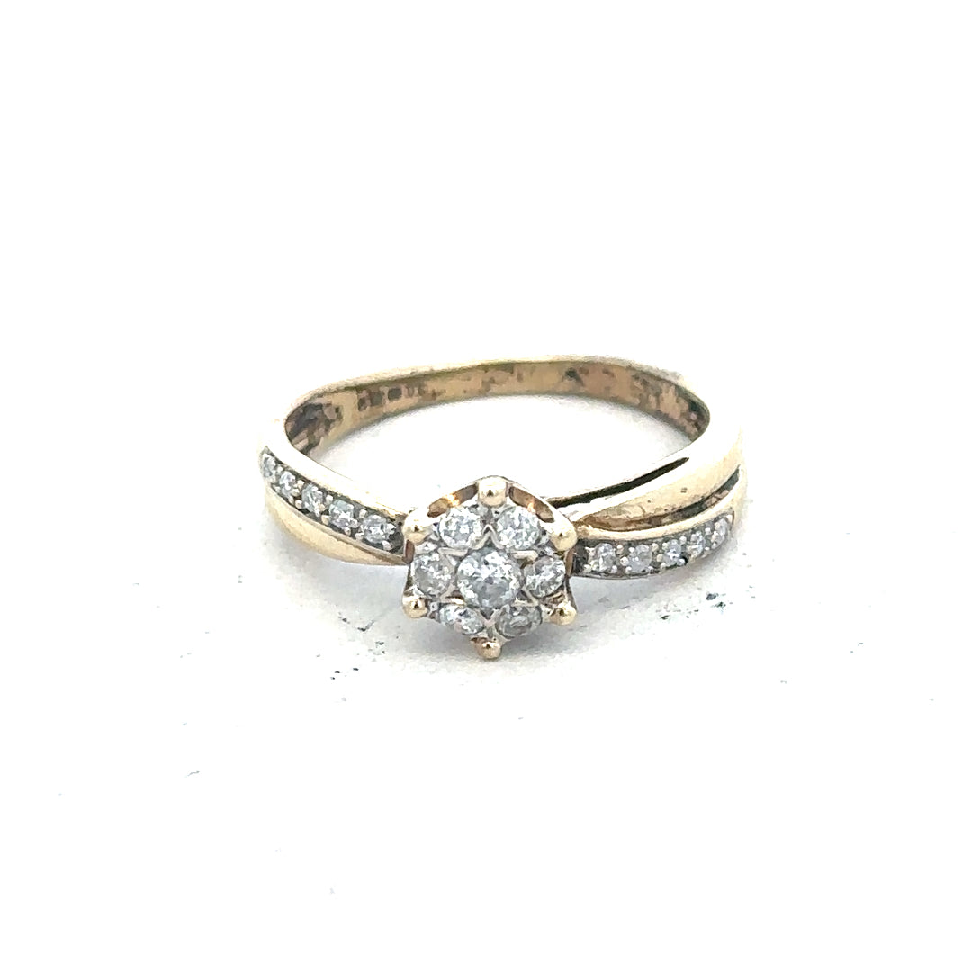 9ct yellow gold ring in size L with a simple band design, unbranded jewelry piece for everyday wear.