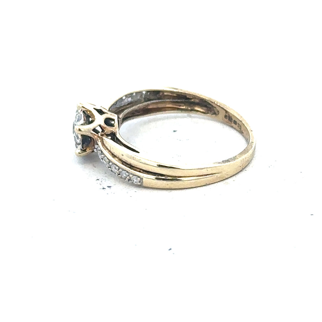 9ct yellow gold ring in size L with a smooth band, unbranded, shown on a neutral background.