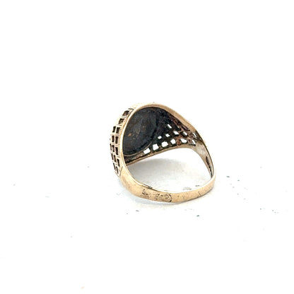9ct yellow gold ring in size L, displayed on a plain background, showing its simple, elegant band design.