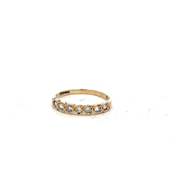 9ct yellow gold ring in size L with a smooth band, unbranded, showcasing a classic and elegant jewelry piece.