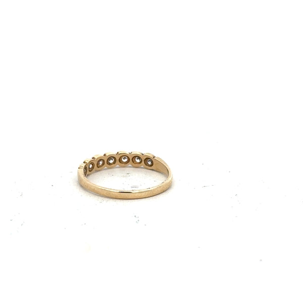9ct yellow gold ring in size L with a smooth band, unbranded, shown from a side angle on a neutral background.