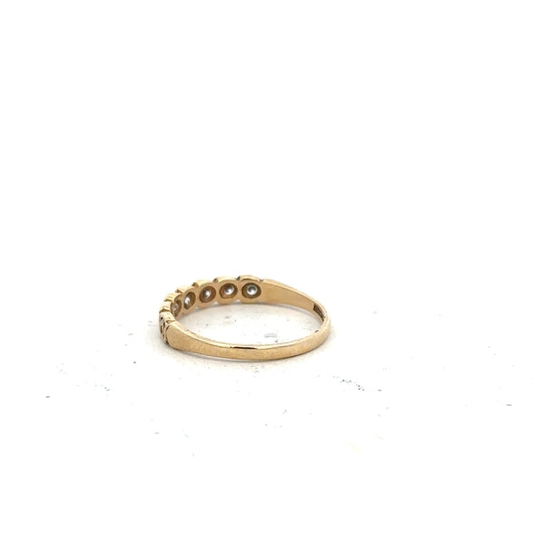 9ct yellow gold ring in size L with a smooth band, unbranded jewelry displayed on a neutral background.