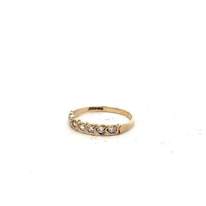 9ct yellow gold ring in size L with a simple polished band, unbranded, shown on a plain background.