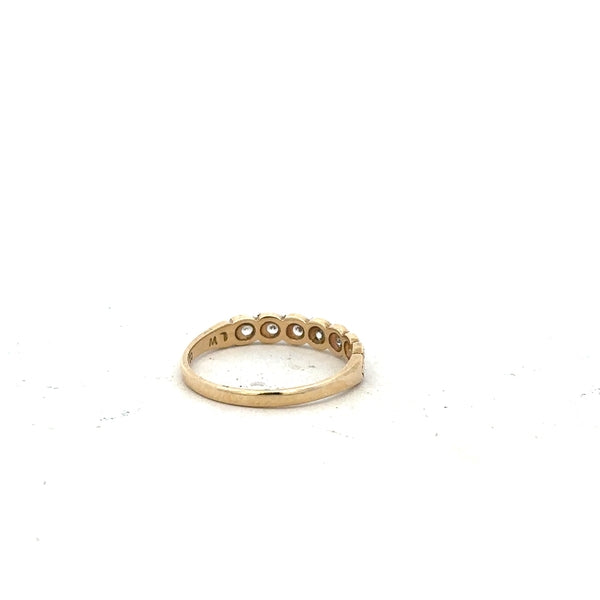 9ct yellow gold ring in size L with a smooth, polished band, designed for elegant wear.