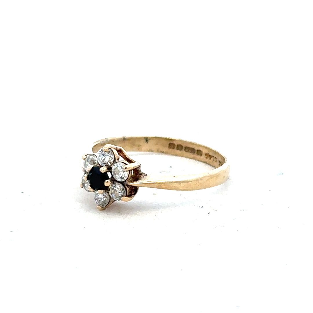9ct yellow gold ring in size L with a simple, elegant band, unbranded jewelry piece displayed on a plain background.