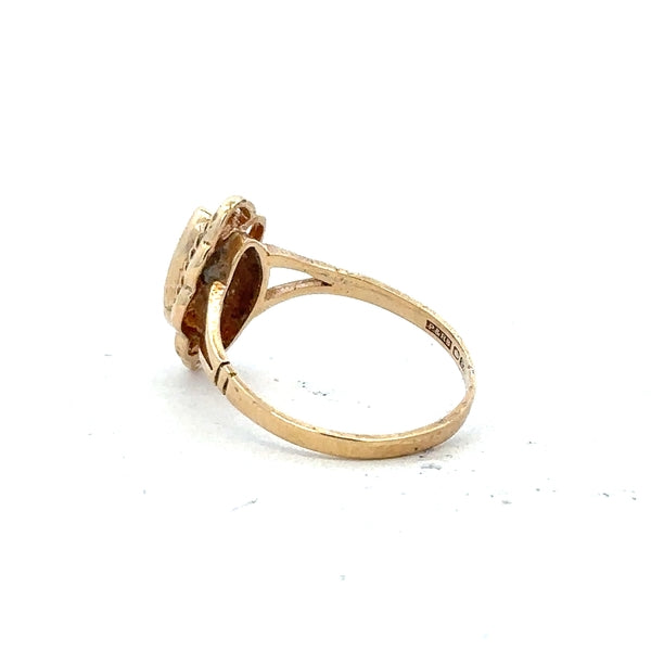 9ct yellow gold ring in size L with a smooth band, unbranded jewelry piece displayed on a neutral background.