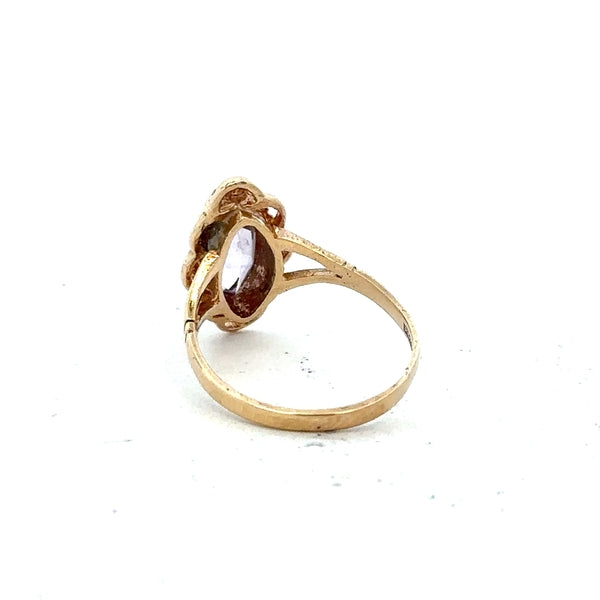 9ct yellow gold ring in size L with a smooth band, unbranded jewelry piece shown on a plain background.