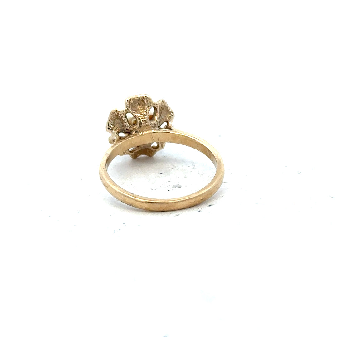 9ct yellow gold ring in size L with a smooth band, unbranded, displayed on a neutral background.