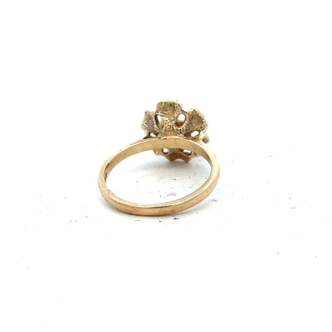 9ct yellow gold ring in size L with a smooth band, unbranded, showcasing a shiny polished finish.