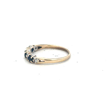 9ct yellow gold ring in size L with a smooth band, unbranded jewelry showcasing elegant craftsmanship.
