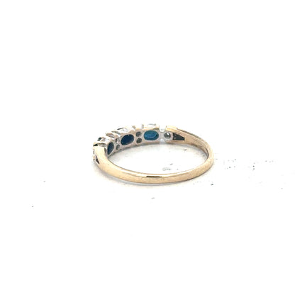 9ct yellow gold ring in size L with a smooth band, unbranded jewelry piece with a polished finish.
