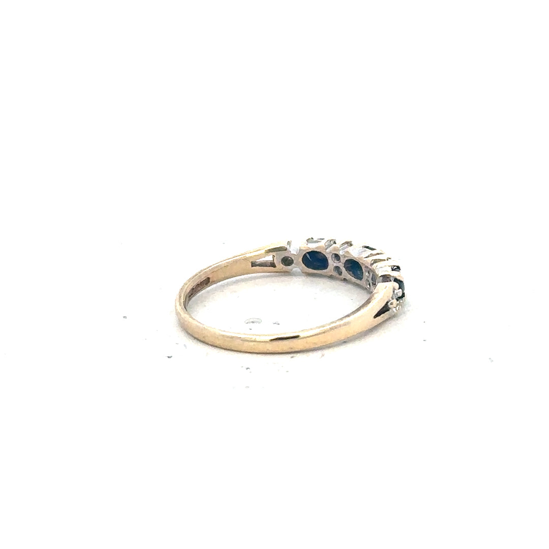 9ct yellow gold ring in size L, unbranded, with a polished band and simple design, shown on a white background.