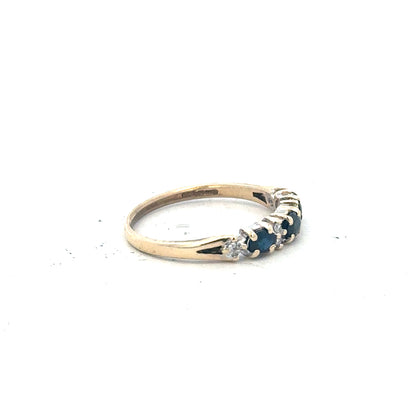 9ct yellow gold ring in size L with a smooth band, unbranded jewelry piece displayed on a plain background.