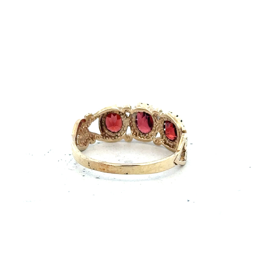 9ct yellow gold ring in size L with a polished finish, unbranded jewelry displayed on a plain background.
