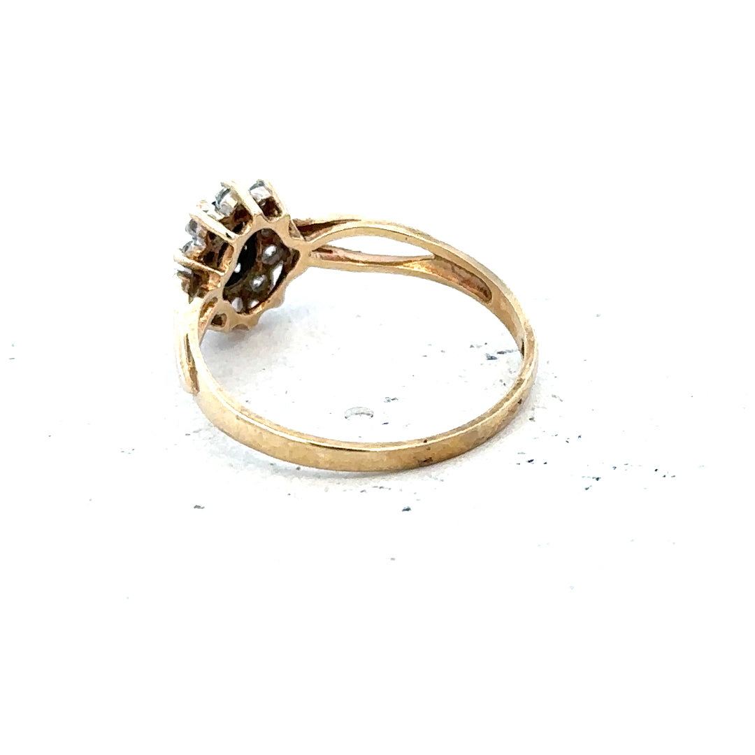 9ct yellow gold ring in size L, showcasing a sleek, polished band with a smooth finish.