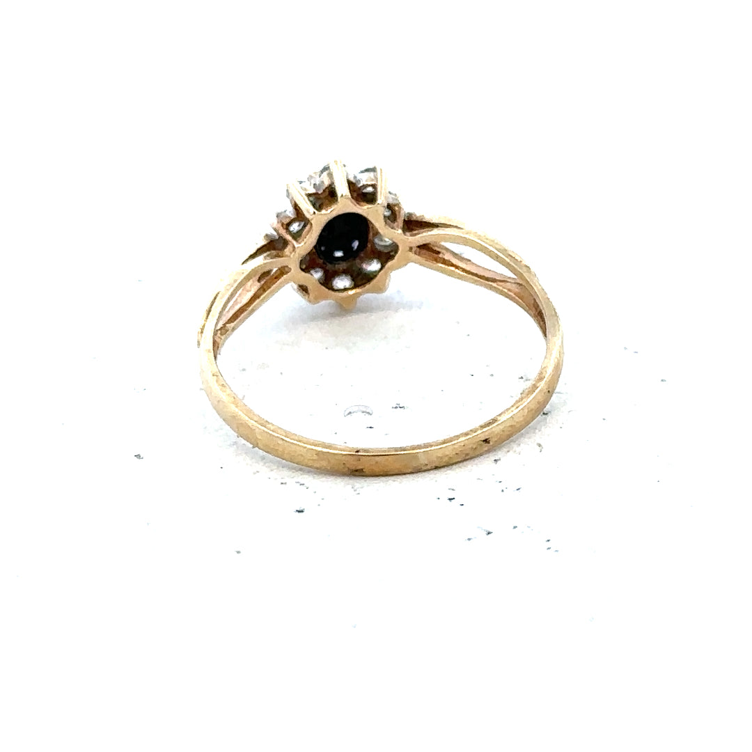 9ct yellow gold ring in size L with smooth band, showcasing a simple, elegant design. Unbranded jewelry accessory.