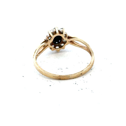 9ct yellow gold ring in size L with smooth band, showcasing a simple, elegant design. Unbranded jewelry accessory.