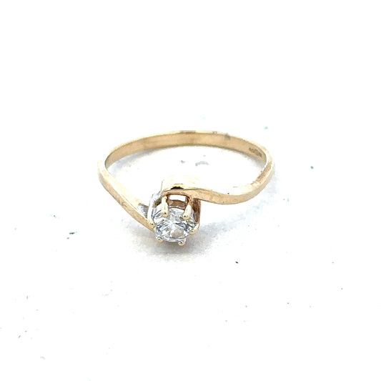 9ct yellow gold ring in size L with a simple band design, unbranded, shown in a close-up image.