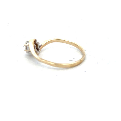 9ct yellow gold ring in size L, featuring a smooth band with a polished finish, displayed on a neutral background.
