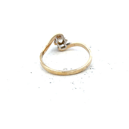 9ct yellow gold ring in size L with a smooth band, unbranded jewelry showcasing elegant gold craftsmanship.