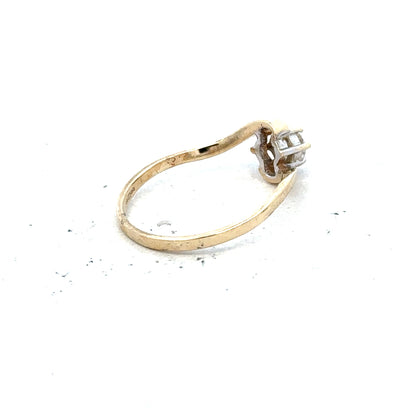 9ct yellow gold ring in size L with a smooth polished finish, unbranded jewelry shown in the image.