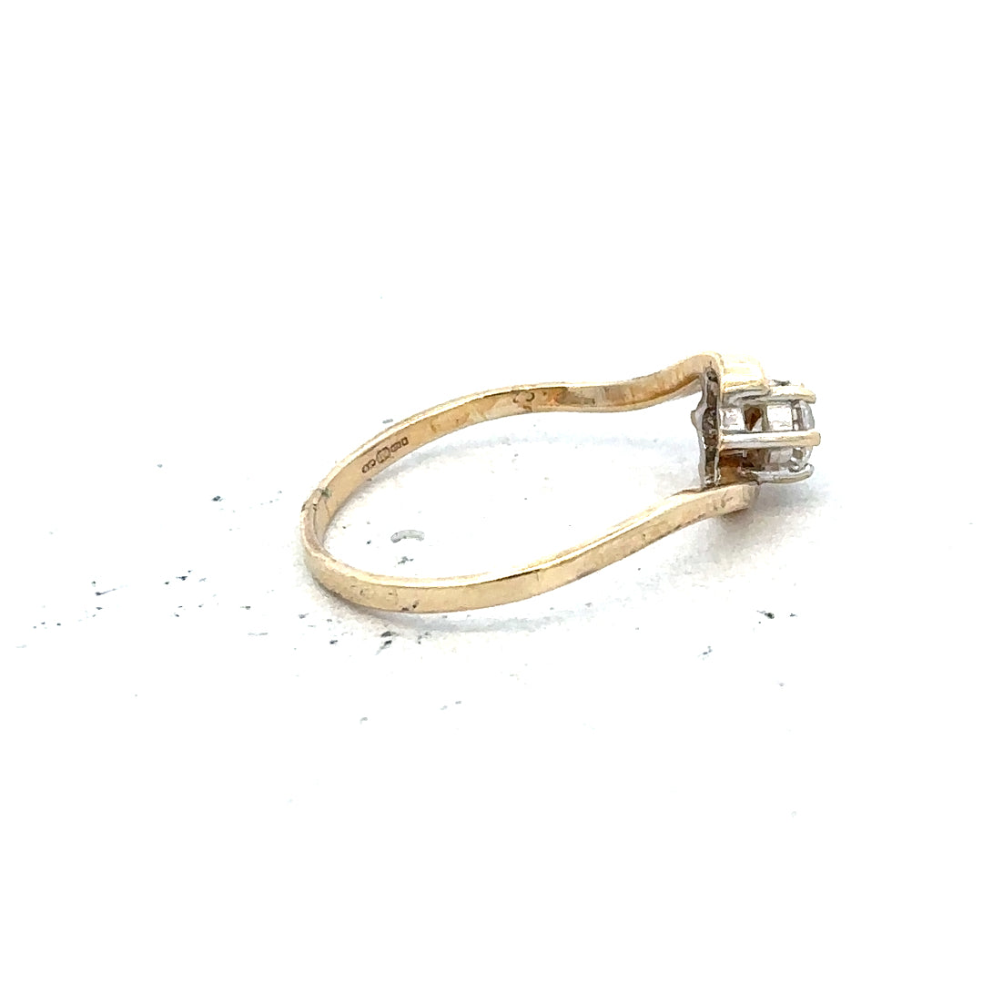 9ct yellow gold ring in size L with a smooth band, unbranded jewelry piece displayed on a neutral background