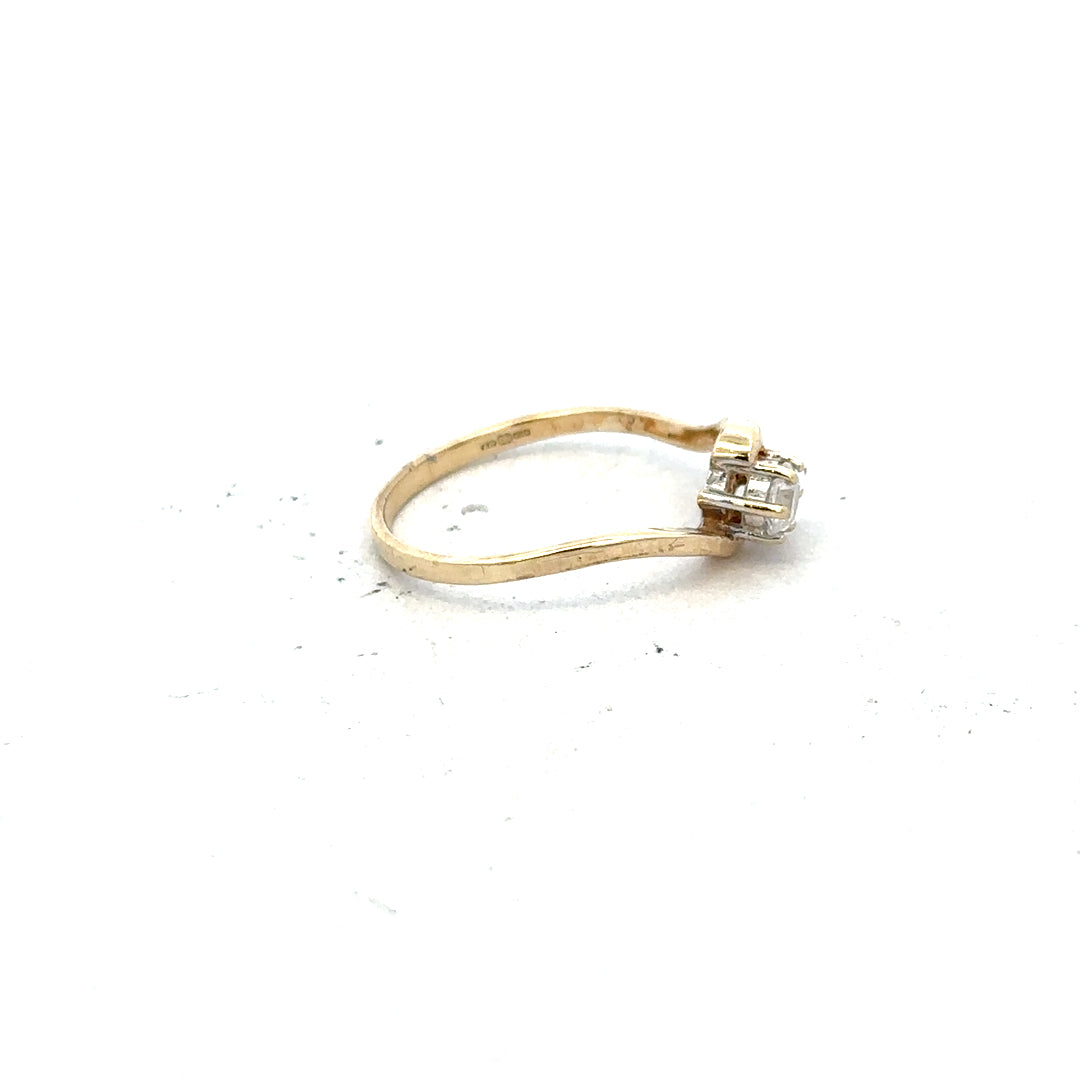 9ct yellow gold ring in size L with a smooth band, featuring a simple and elegant design.